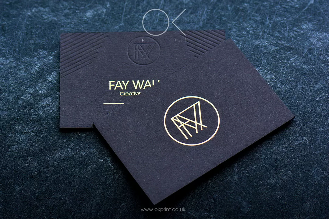 Black premium business cards with gold foiled logo
